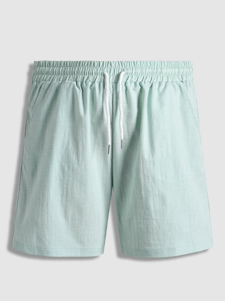 Men's solid color textured casual elastic waist shorts